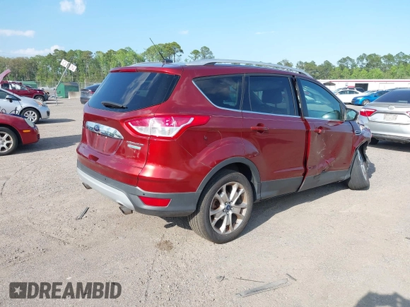 2014 Ford Escape Titanium with VIN 1FMCU0JX7EUB96463, listed as a IAAI auction lot 41935190 with 67,098 mi miles. Bid and sale history available at carsss.com. Image 4.