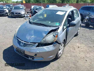 2009 Honda Fit with VIN JHMGE882X9S000639, listed as a IAAI auction lot 42308524 with 211,128 mi miles and . Bid and sale history available at DreamBid. Image 6.
