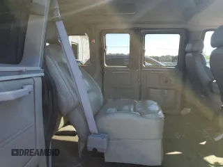 2004 Chevrolet Express Passenger z VIN 1GBFG15T841212230, wystawiony jako Copart lot #61109634 z przebiegiem 154 493 mil mil oraz Szkoda całkowita • Salvage title. Historia ofert i sprzedaży dostępna na DreamBid. Obrazek 11.