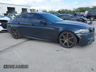 2013 BMW M5 with VIN WBSFV9C59DD096774, listed as a IAAI auction lot 41608286 with 82,601 mi miles. Bid and sale history available at carsss.com. Image 1.