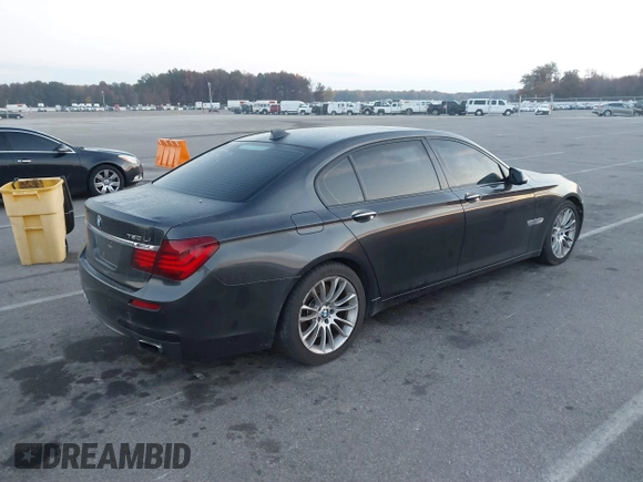 2014 BMW 7 Series ALPINA B7 with VIN WBAYE8C58ED136240, listed as a IAAI auction lot 40701912 with 116,246 mi miles. Bid and sale history available at carsss.com. Image 4.
