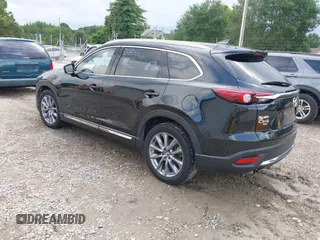 2022 Mazda CX-9 Grand Touring with VIN JM3TCBDYXN0627657, listed as a IAAI auction lot 42498856 with 61,044 mi miles and . Bid and sale history available at DreamBid. Image 3.