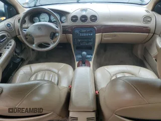 1999 Chrysler LHS z VIN 2C3HC56G1XH774330, wystawiony jako Copart lot #57080005 z przebiegiem 113 775 mil mil oraz Szkody całkowita. Historia ofert i sprzedaży dostępna na DreamBid. Obrazek 8.