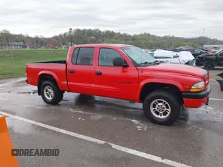 2000 Dodge Dakota Sport with VIN 1B7GG2ANXYS621732, listed as a IAAI auction lot 41930673 with 145,653 mi miles and . Bid and sale history available at carsss.com. Image 13.