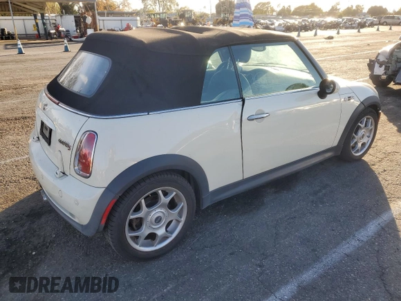 2007 MINI Convertible S with VIN WMWRH33567TL94957, listed as a Copart auction lot 42127775 with 90,401 mi miles and Salvage title. Bid and sale history available at DreamBid. Image 3.