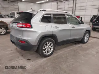 2014 Jeep Cherokee Altitude with VIN 1C4PJMCB9EW149754, listed as a IAAI auction lot 41983427 with 199,810 mi miles and . Bid and sale history available at DreamBid. Image 4.