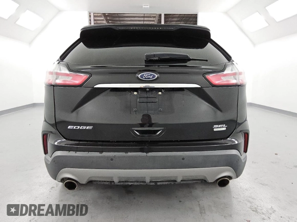 2020 Ford Edge SEL с VIN 2FMPK3J90LBA73990, выставлен на аукционе Copart как лот 61035945 с пробегом 113 511 миль миль и Чистый • Clean title. История ставок и продаж доступна на DreamBid. Изображение 6.