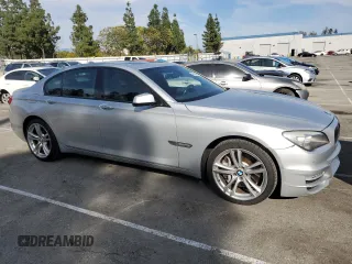 2012 BMW 7 Series 750i z VIN WBAKA8C50CDS99866, wystawiony jako Copart lot #48728465 z przebiegiem 129 547 mil mil oraz Szkoda całkowita • Salvage title. Historia ofert i sprzedaży dostępna na DreamBid. Obrazek 4.