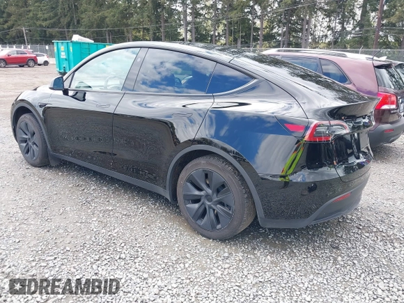 2024 Tesla Model Y with VIN 7SAYGDED3RF119101, listed as a IAAI auction lot 42019817 with 35,714 mi miles and . Bid and sale history available at DreamBid. Image 3.