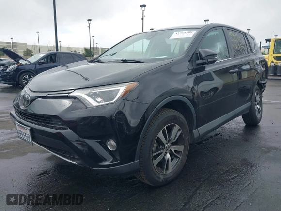 2018 Toyota RAV4 XLE with VIN 2T3WFREV3JW516867, listed as a IAAI auction lot 41765369 with 54,390 mi miles. Bid and sale history available at carsss.com. Image 18.