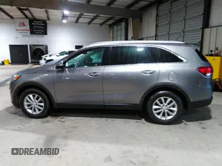2017 Kia Sorento LX V6 with VIN 5XYPG4A52HG214862, listed as a IAAI auction lot 41986714 with 64,498 mi miles. Bid and sale history available at carsss.com. Image 14.