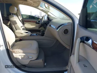 2013 Audi Q7 Premium Plus with VIN WA1LGAFE9DD011184, listed as a IAAI auction lot 42097346 with 148,786 mi miles and . Bid and sale history available at DreamBid. Image 5.