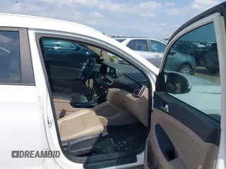 2019 Hyundai Tucson Sport with VIN KM8J33AL1KU861698, listed as a IAAI auction lot 42129173 with 100,160 mi miles. Bid and sale history available at carsss.com. Image 5.