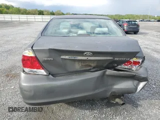 2005 Toyota Camry LE with VIN 4T1BF32K45U599214, listed as a Copart auction lot 52609295 with 304,316 mi miles and Salvage Title. Bid and sale history available at DreamBid. Image 6.