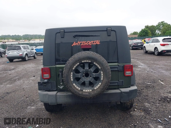 2007 Jeep Wrangler Unlimited X with VIN 1J4GA39127L231378, listed as a IAAI auction lot 42252475 with 152,568 mi miles and . Bid and sale history available at DreamBid. Image 17.
