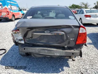 2006 Kia Spectra EX z VIN KNAFE121965370962, wystawiony jako Copart lot #57651215 z przebiegiem 152 308 mil mil oraz Szkody całkowita. Historia ofert i sprzedaży dostępna na DreamBid. Obrazek 6.