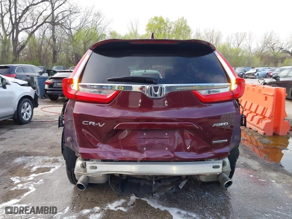 2017 Honda CR-V Touring with VIN 5J6RW2H95HL074264, listed as a IAAI auction lot 41974804 with 94,923 mi miles. Bid and sale history available at carsss.com. Image 17.