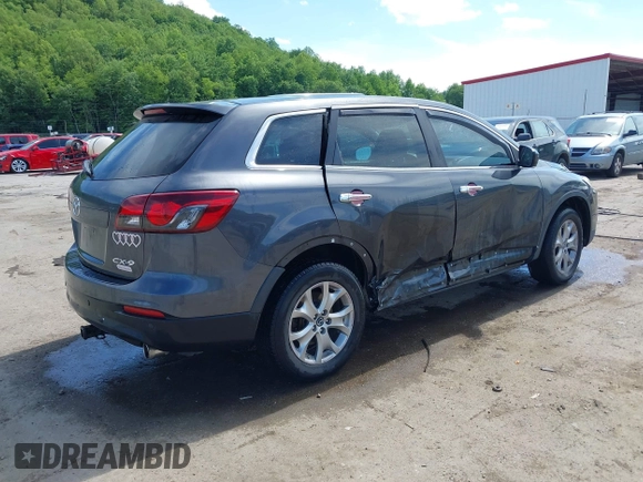 2014 Mazda CX-9 Touring with VIN JM3TB3CV9E0426767, listed as a IAAI auction lot 42301021 with 129,497 mi miles and . Bid and sale history available at DreamBid. Image 4.
