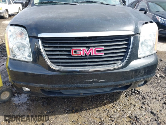 2014 GMC Yukon XL SLT with VIN 1GKS2KE77ER199723, listed as a IAAI auction lot 41555112 with 215,436 mi miles. Bid and sale history available at carsss.com. Image 6.
