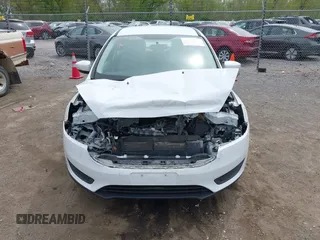 2016 Ford Focus SE with VIN 1FADP3F21GL403121, listed as a IAAI auction lot 42130743 with 103,592 mi miles and . Bid and sale history available at DreamBid. Image 12.