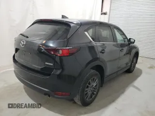 2021 Mazda CX-5 Touring with VIN JM3KFBCM5M0343577, listed as a Copart auction lot 52411005 with 70,372 mi miles and Clean Title. Bid and sale history available at carsss.com. Image 3.