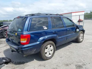 2001 Jeep Grand Cherokee Limited with VIN 1J4GX58S01C657436, listed as a IAAI auction lot 42102133 with 194,897 mi miles and . Bid and sale history available at DreamBid. Image 4.