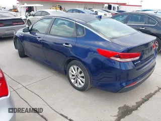 2016 Kia Optima LX with VIN 5XXGT4L30GG073039, listed as a IAAI auction lot 42055627 with Not Provided miles and . Bid and sale history available at carsss.com. Image 3.