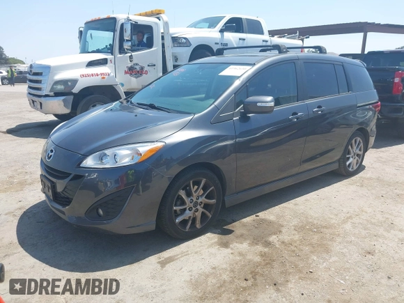 2014 Mazda 5 Grand Touring with VIN JM1CW2DL8E0171095, listed as a IAAI auction lot 41962650 with 85,048 mi miles and . Bid and sale history available at DreamBid. Image 18.