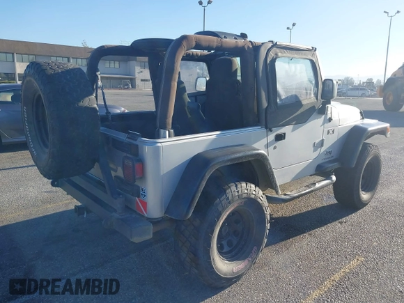 2005 Jeep Wrangler X with VIN 1J4FA39S55P348432, listed as a IAAI auction lot 41868451 with 166,876 mi miles. Bid and sale history available at carsss.com. Image 4.