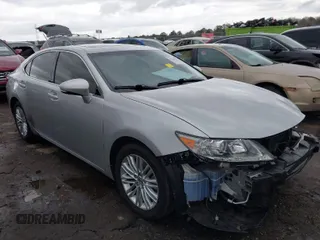 2013 Lexus ES 4dr Sdn with VIN JTHBK1GG1D2034954, listed as a IAAI auction lot 41720790 with 136,447 mi miles. Bid and sale history available at carsss.com. Image 1.