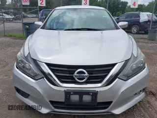 2017 Nissan Altima SV with VIN 1N4AL3AP3HC151424, listed as a IAAI auction lot 42697536 with 157,066 mi miles and . Bid and sale history available at DreamBid. Image 12.