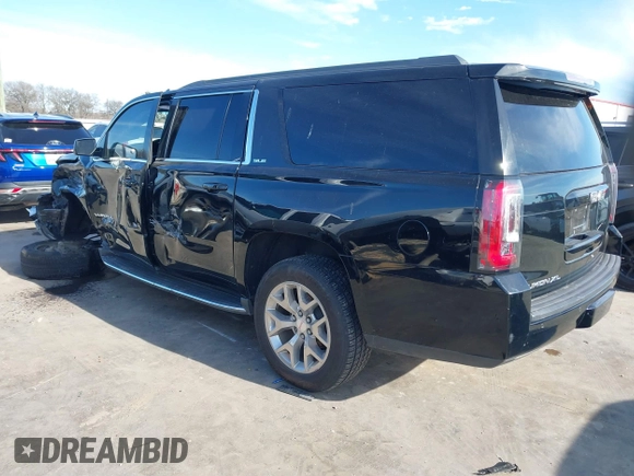 2016 GMC Yukon XL SLE with VIN 1GKS1FKC9GR442107, listed as a IAAI auction lot 41309092 with 130,117 mi miles. Bid and sale history available at carsss.com. Image 3.