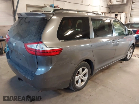 2015 Toyota Sienna LE AAS with VIN 5TDKK3DC6FS652281, listed as a IAAI auction lot 41891750 with 150,162 mi miles. Bid and sale history available at carsss.com. Image 4.