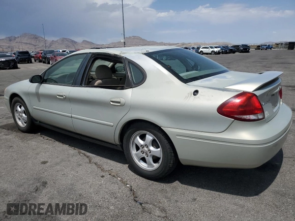 2007 Ford Taurus SE with VIN 1FAFP53U27A156844, listed as a Copart auction lot 59204695 with 157,633 mi miles and Salvage title. Bid and sale history available at DreamBid. Image 2.