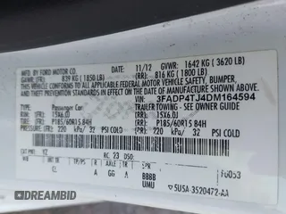 2013 Ford Fiesta S with VIN 3FADP4TJ4DM164594, listed as a IAAI auction lot 42154202 with 75,860 mi miles and . Bid and sale history available at DreamBid. Image 9.
