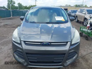 2013 Ford Escape SE with VIN 1FMCU9G95DUC01185, listed as a IAAI auction lot 42602840 with 140,697 mi miles and . Bid and sale history available at DreamBid. Image 12.