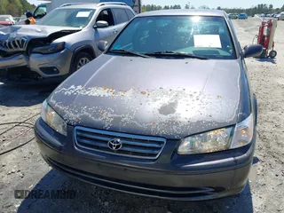2000 Toyota Camry CE z VIN 4T1BG22K5YU989265, wystawiony jako IAAI lot #41800338 z przebiegiem 381 964 mil mil oraz . Historia ofert i sprzedaży dostępna na DreamBid. Obrazek 6.