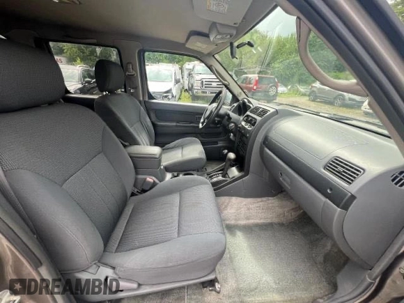 2004 Nissan Frontier SC z VIN 1N6MD29Y24C441110, wystawiony jako Copart lot #75842344 z przebiegiem 119 954 mil mil oraz Czysty tytuł • Clean title. Historia ofert i sprzedaży dostępna na DreamBid. Obrazek 5.