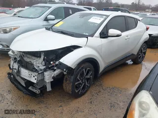 2019 Toyota C-HR XLE with VIN NMTKHMBX4KR080517, listed as a IAAI auction lot 41564786 with 102,508 mi miles. Bid and sale history available at carsss.com. Image 17.