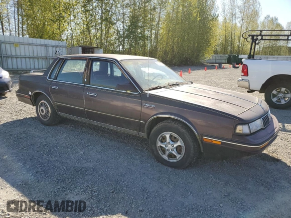 1987 Oldsmobile Cutlass Ciera with VIN 2G3AM51RXH9391582, listed as a Copart auction lot 53736795 with 81,728 mi miles and Clean Title. Bid and sale history available at DreamBid. Image 4.