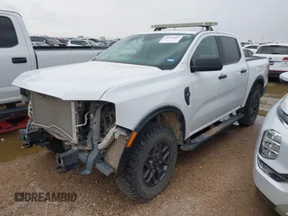 2024 Ford Ranger XLT with VIN 1FTER4HH8RLE21828, listed as a IAAI auction lot 42205087 with 61,159 mi miles and . Bid and sale history available at DreamBid. Image 2.