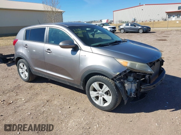 2012 Kia Sportage LX with VIN KNDPBCA27C7318056, listed as a IAAI auction lot 41887312 with 144,940 mi miles and . Bid and sale history available at DreamBid. Image 1.