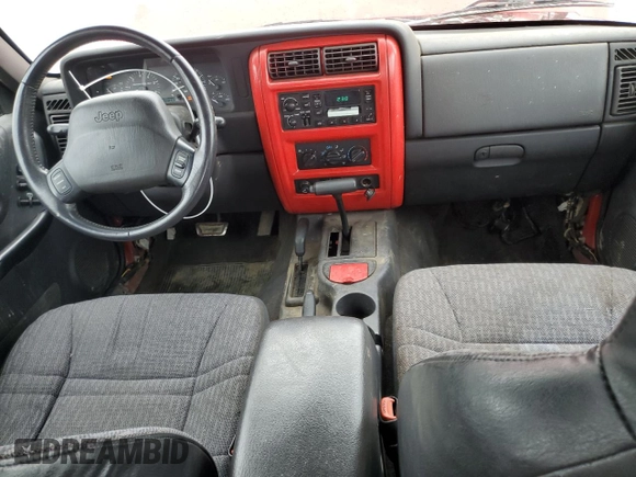 1999 Jeep Cherokee Sport with VIN 1J4FF68S1XL522902, listed as a Copart auction lot 55947745 with 212,357 mi miles and Non repairable. Bid and sale history available at DreamBid. Image 8.