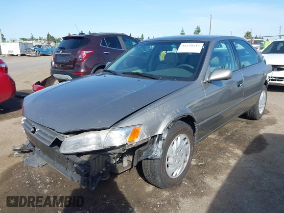 1997 Toyota Camry LE z VIN 4T1BF22K1VU025776, wystawiony jako IAAI lot #42270137 z przebiegiem 168 299 mil mil oraz . Historia ofert i sprzedaży dostępna na DreamBid. Obrazek 21.