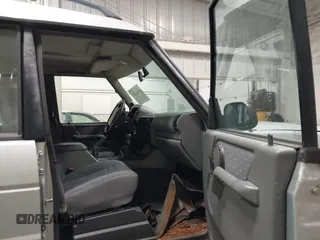 1996 Land Rover Discovery z VIN SALJY1282TA192177, wystawiony jako IAAI lot #42221390 z przebiegiem 167 727 mil mil oraz . Historia ofert i sprzedaży dostępna na DreamBid. Obrazek 5.