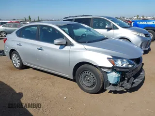2018 Nissan Sentra S z VIN 3N1AB7AP3JY294359, wystawiony jako IAAI lot #42367367 z przebiegiem 96 842 mil mil oraz . Historia ofert i sprzedaży dostępna na DreamBid. Obrazek 1.