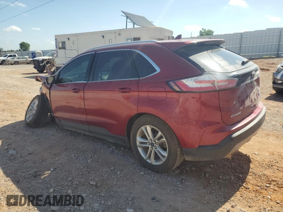 2019 Ford Edge SEL with VIN 2FMPK3J9XKBB38715, listed as a Copart auction lot 62156395 with 125,758 mi miles and Salvage title. Bid and sale history available at DreamBid. Image 2.