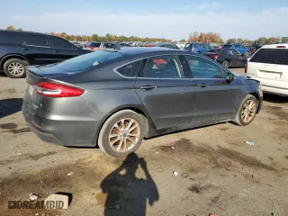 2020 Ford Fusion Plug-In Hybrid Titanium with VIN 3FA6P0SU5LR230939, listed as a Copart auction lot 77899134 with 104,656 mi miles and Salvage Title. Bid and sale history available at carsss.com. Image 3.