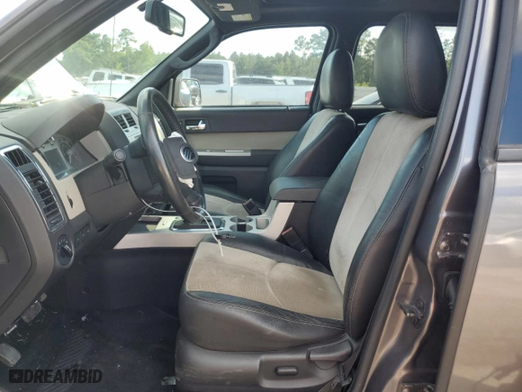 2010 Mercury Mariner Premier with VIN 4M2CN8HG5AKJ00531, listed as a Copart auction lot 68167794 with 184,969 mi miles and Salvage Title. Bid and sale history available at carsss.com. Image 7.