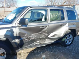2013 Jeep Patriot Latitude with VIN 1C4NJPFA1DD169521, listed as a IAAI auction lot 41812936 with 133,088 mi miles. Bid and sale history available at carsss.com. Image 6.